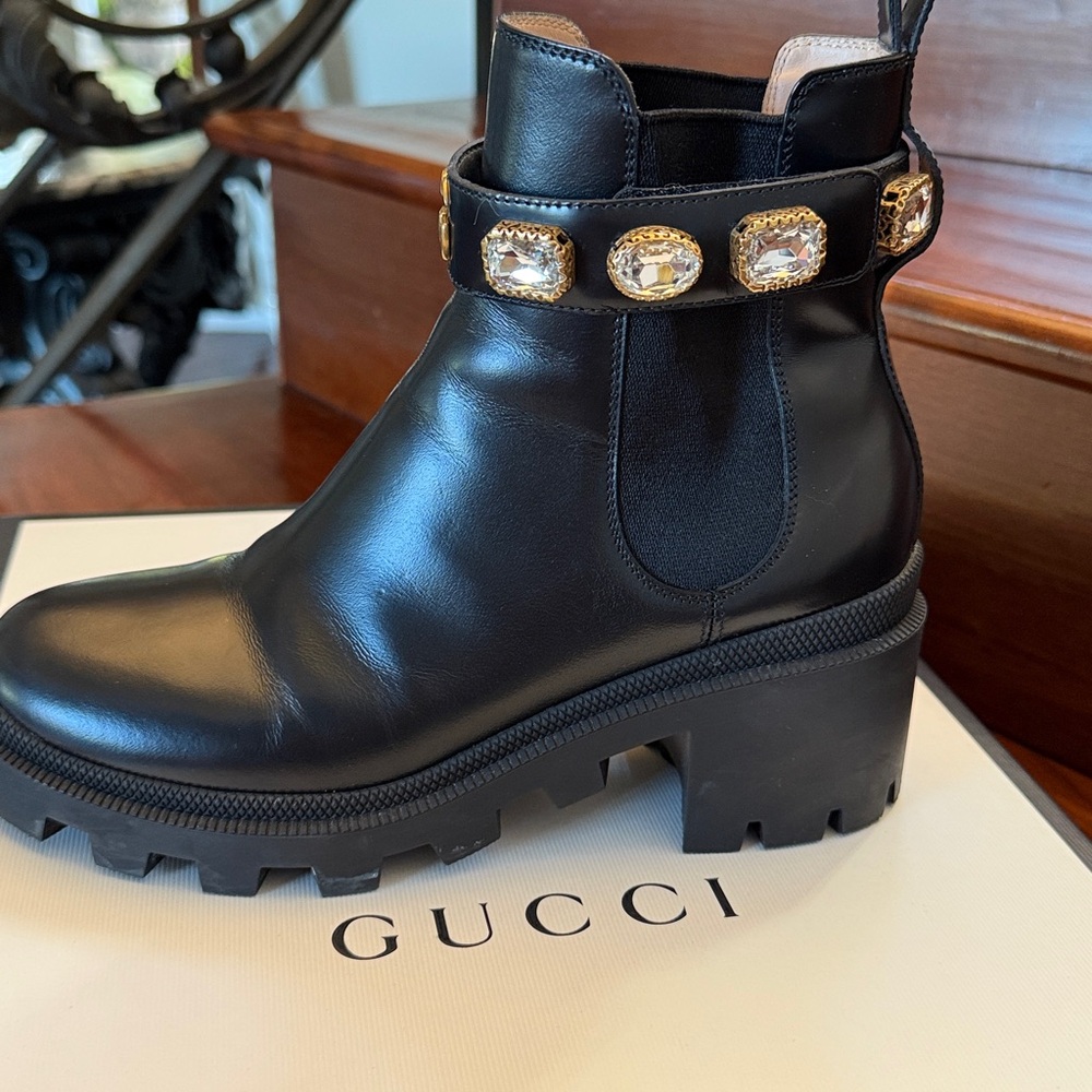 Gucci Black Leather Boots with Gold Embellishments